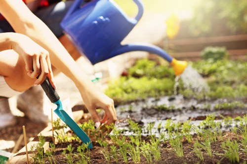 Technician preparing pressure washer for driveway cleaning